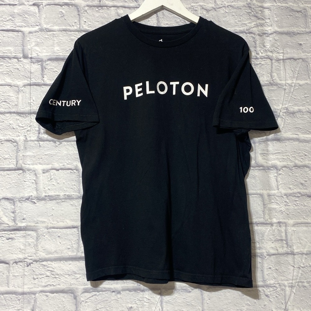 Peloton black shirt bike